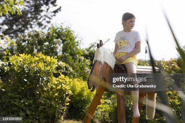 In this photo illustration a girl gymnastics on a wooden horse on May 09, 2022 in Bonn, Germany.