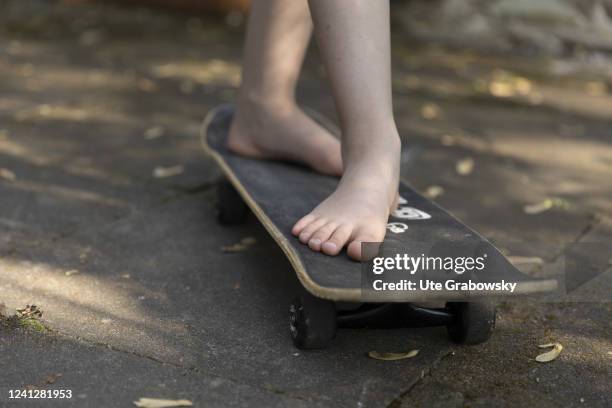 In this photo illustration a child with skateboard on May 09, 2022 in Bonn, Germany.