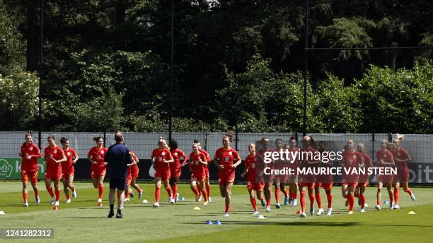 Netherlands' footballers jog during a training session of the Dutch women's national team at The KNVB Campus in Zeist on June 13 where the Dutch...