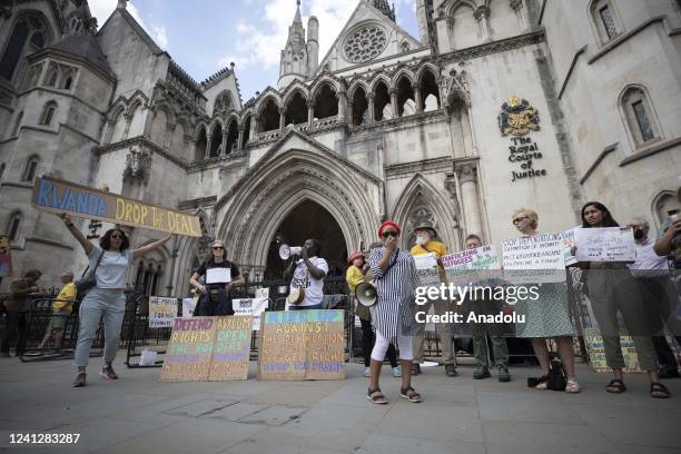 Protesters demonstrate outside the Supreme Court against the Home Office's plan to relocate individuals identified as illegal immigrants or asylum...