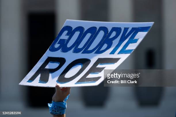 Pro-life activists protest outside of the U.S. Supreme Court as they wait for the court to hand down its decision to overturn Roe v. Wade on Monday...