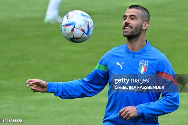 Italy's defender Leonardo Spinazzola plays the ball during a training session of Italy's national football team in Moenchengladbach, western Germany,...