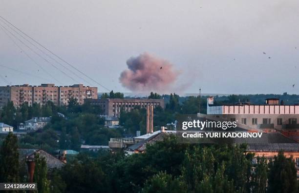Smoke rises after shelling in Donetsk, amid the ongoing Russian military action in Ukraine, on June 13, 2022.
