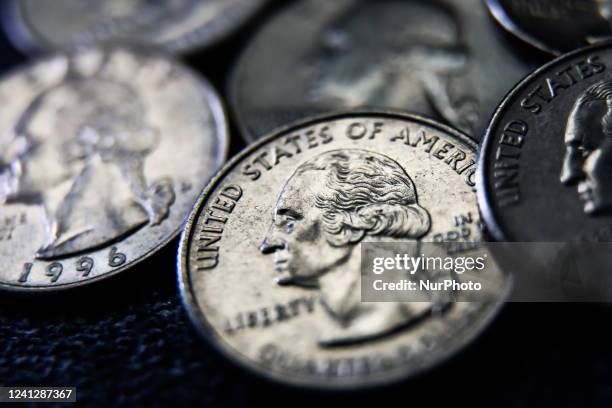 United States quarter dollar coins are seen in this illustration photo taken in Krakow, Poland on June 13, 2022.