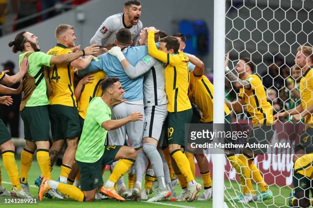 Andrew Redmayne of Australia celebrates after saving the winning the penalty in the shoot out, resulting in qualifying for the 2022 FIFA World Cup...
