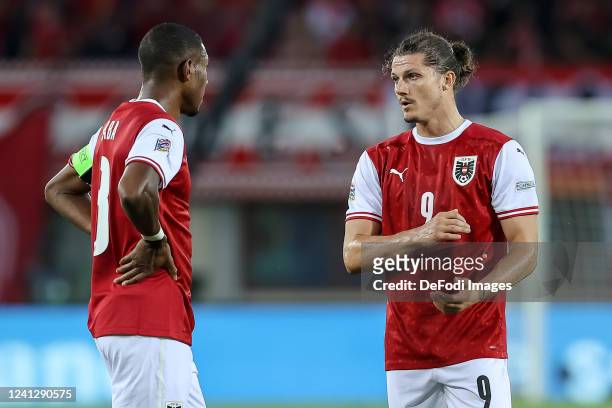David Alaba of Austria and Marcel Sabitzer of Austria to discuss during the UEFA Nations League League A Group 1 match between Austria and France at...