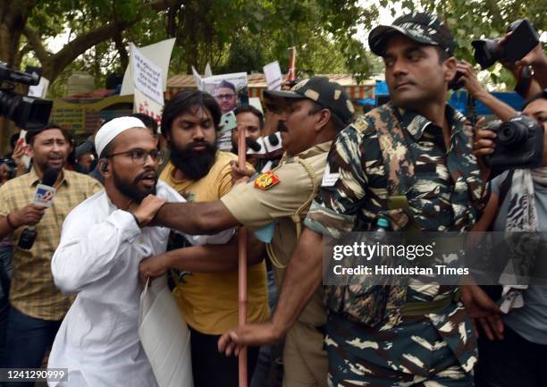 Police detains AISA members during their protest against Modi and Yogi Government over Bulldozer drive against riot accused in Uttar Pradesh at...