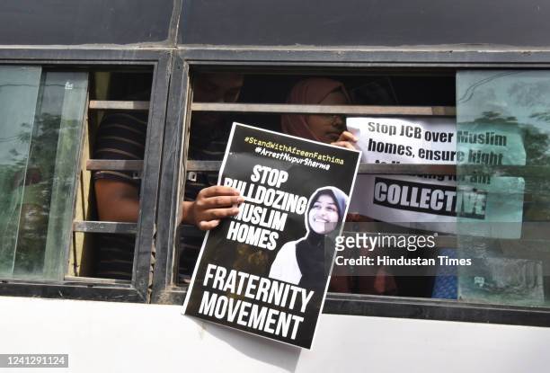 Activists of Fraternity movement, Students Islamic Organisation of India and others being detained by police personnel during a protest against the...