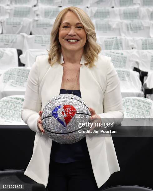 Analyst, Doris Burke poses with the NBA 75th Anniversary ball during Game Four of the 2022 NBA Finals on June 10, 2022 at TD Garden in Boston,...