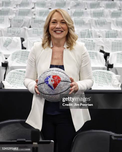 Analyst, Doris Burke poses with the NBA 75th Anniversary ball during Game Four of the 2022 NBA Finals on June 10, 2022 at TD Garden in Boston,...