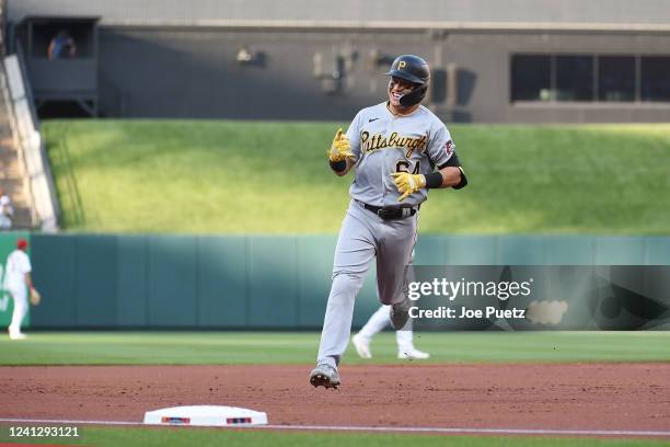 Diego Castillo of the Pittsburgh Pirates reacts while rounding third base after hitting a solo home run against the St. Louis Cardinals during the...