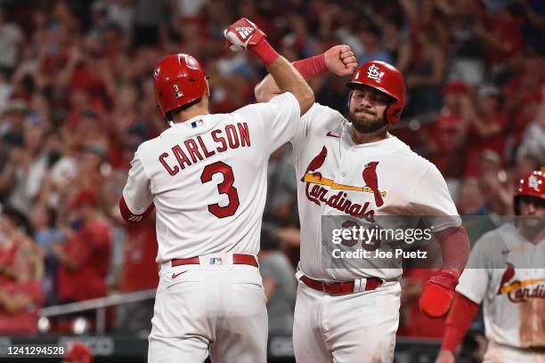 Dylan Carlson of the St. Louis Cardinals is congratulated by Juan Yepez after Carlson hit a three-run home run against the Pittsburgh Pirates during...
