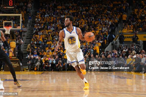 Andrew Wiggins of the Golden State Warriors dribbles the ball against the Boston Celtics during Game Five of the 2022 NBA Finals on June 13, 2022 at...