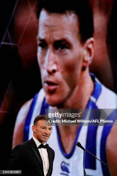 Brent Harvey speaks after being inducted into the Hall of Fame during the 2022 Australian Football Hall of Fame Dinner at Crown Palladium on June 14,...