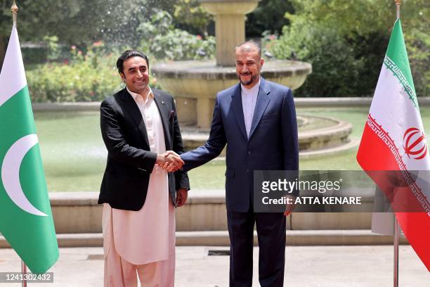 Iran's Foreign Minister Hossein Amir-Abdollahian receives his Pakistani counterpart Bilawal Bhutto Zardari at the foreign ministry headquarters in...