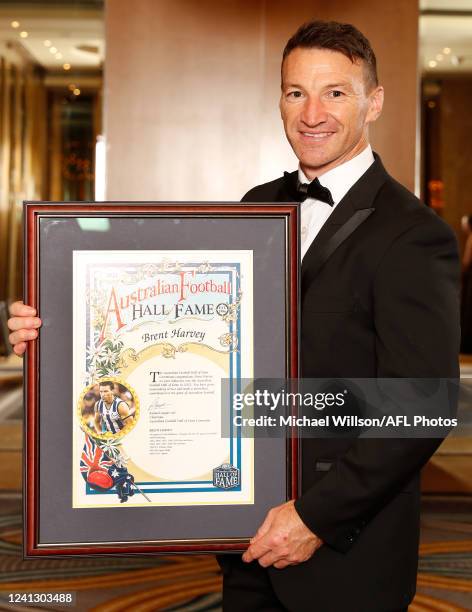 Inductee Brent Harvey poses for a photograph during the 2022 Australian Football Hall of Fame Dinner at Crown Palladium on June 14, 2022 in...