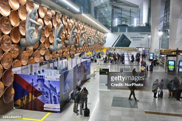 Mudras are displayed along a wall at Indira Gandhi International Airport in Delhi, India, on May 03, 2022.