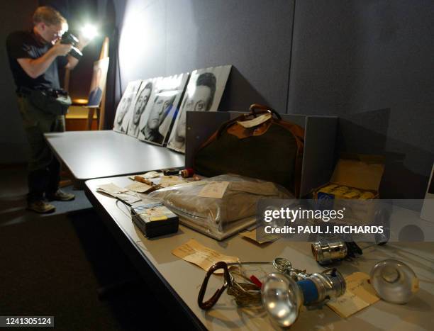 Photographer takes a photo of evidence from the infamous Watergate break-in at the Democratic National Committee headquarters at the Watergate Office...