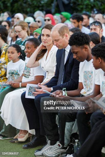 Britain's Catherine, Duchess of Cambridge and Britain's Prince William, Duke of Cambridge attend a memorial service at the foot of Grenfell Tower in...