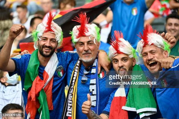 Italy fans cheer as they wait for the start prior to the UEFA Nations League football match Germany v Italy at the Borussia Park stadium in...