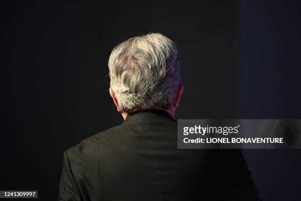 France's leftist La France Insoumise party leader, Member of Parliament and leader of left-wing coalition Nupes Jean-Luc Melenchon is seen from back...