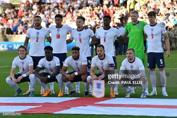England's defender Kyle Walker, England's midfielder Jude Bellingham, England's midfielder Kalvin Phillips, England's defender Marc Guehi, England's...