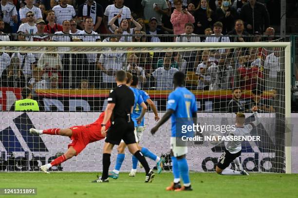 Germany's forward Timo Werner scores the 4-0 goal during the UEFA Nations League football match Germany v Italy at the Borussia Park stadium in...