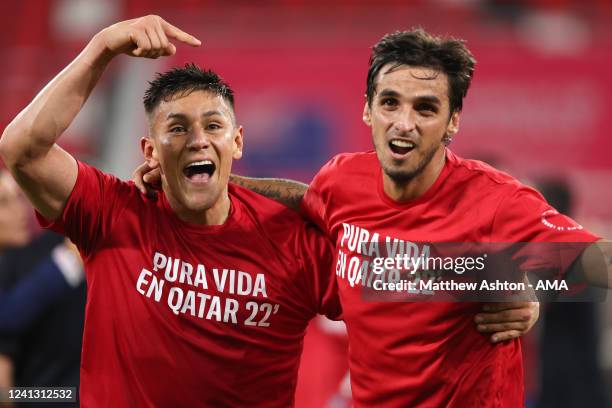 Jewison Bennette and Bryan Ruiz of Costa Rica celebrate victory after the 2022 FIFA World Cup Playoff match between Costa Rica and New Zealand at...