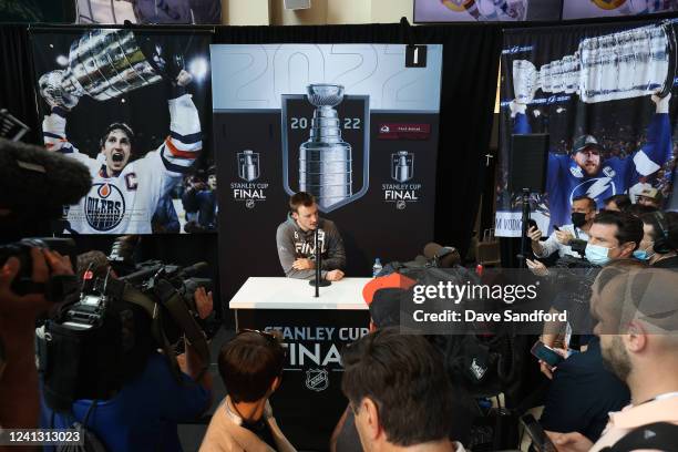 Cale Makar of the Colorado Avalanche takes questions from the media during the 2022 Stanley Cup Final Media Day on June 14, 2022 at Ball Arena in...
