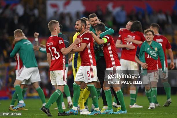 Hungary's players celebrate on the pitch after the UEFA Nations League, league A group 3 football match between England and Hungary at Molineux...