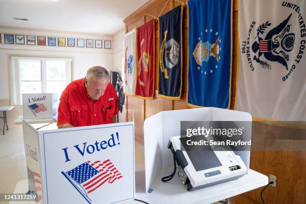 People cast their ballots during midterm primary elections on June 14, 2022 in South Congaree, South Carolina. Maine, Nevada and North Dakota also...