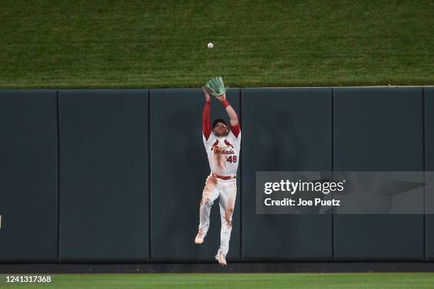 Harrison Bader of the St. Louis Cardinals catches a fly ball by the Pittsburgh Pirates in the seventh inning during the second game of a double...