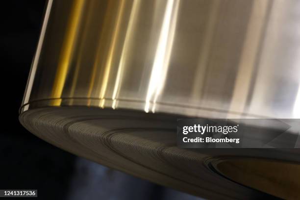 Coil of nickel brass sheet used for rings of Japanese 500 yen coins ahead of the blanking process during the yen coin production at a Japan Mint...