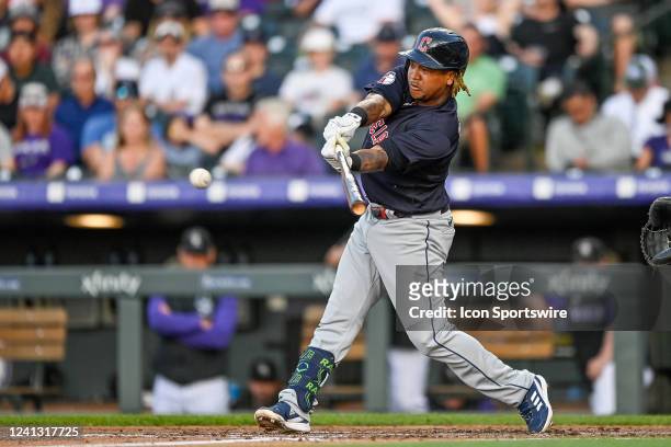 Cleveland Guardians third baseman Jose Ramirez hits a third inning two-run double against the Colorado Rockies during a game at Coors Field on June...
