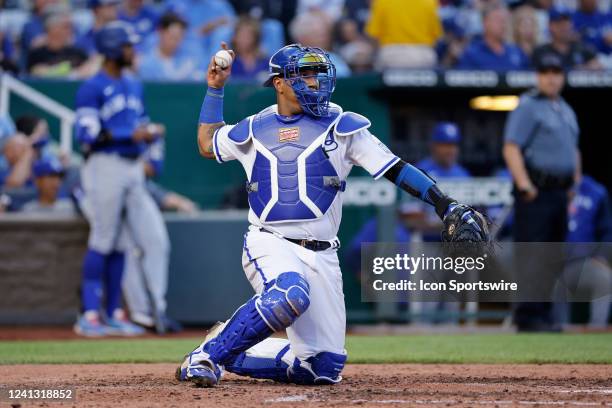 Kansas City Royals catcher Salvador Perez throws the ball back to the mound during an MLB game against the Toronto Blue Jays on June 7, 2022 at...