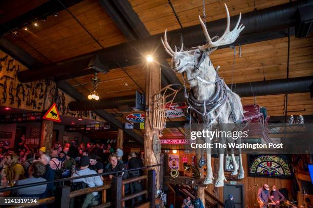 Skiers and snowboarders après at the Mangy Moose at Jackson Hole Mountain Resort on Dec. 11, 2021 in Teton Village, Wyo.