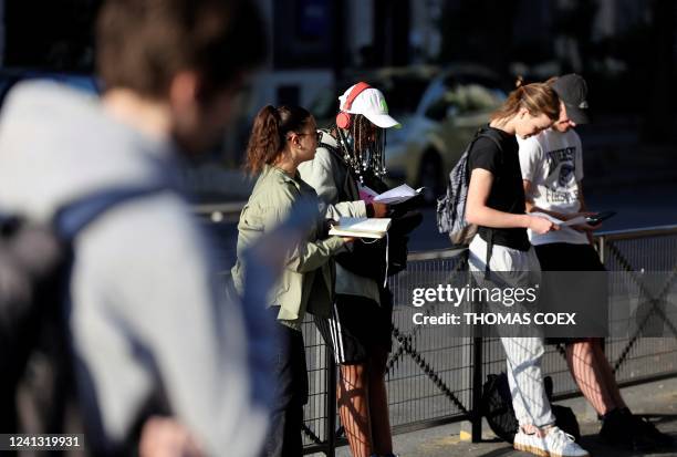 High school students make final reviews for the philosophic baccalaureate exam at the Lycee Arago in Paris, on June 15, 2022. - The final stretch for...