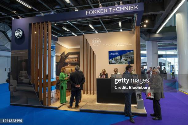 The booth of Fokker Techniek BV, an aircraft maintenance and completion company, at the Aircraft Interiors Expo in Hamburg, Germany, on Wednesday,...