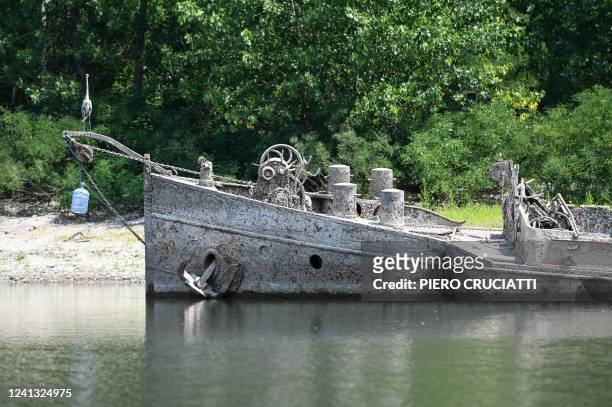 Heron stands on a large 55-meter barge that was sunk by WWII American bombing in 1944 while preventing retreat of the German army, that re-emerged...