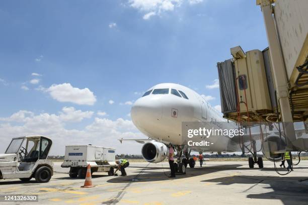 Cham Wings Airlines Airbus A320-211 is pictured at the Syria's Aleppo airport after flights were diverted from Damascus aiport following an Israeli...