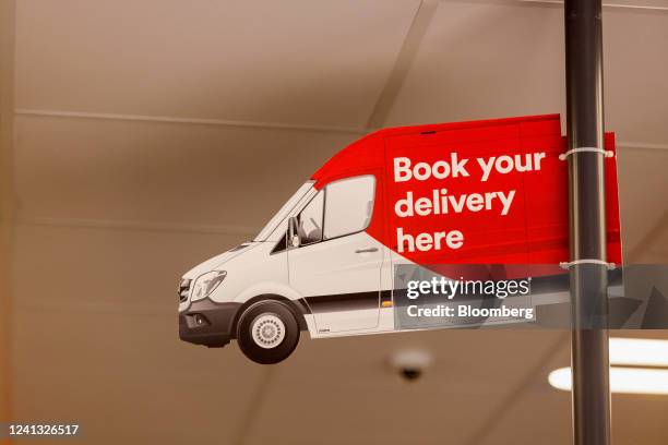 Sign for a delivery service above the check-outs at a Iceland Foods Ltd. Supermarket in Christchurch, UK, on Wednesday, June 15, 2022. "Britain's...