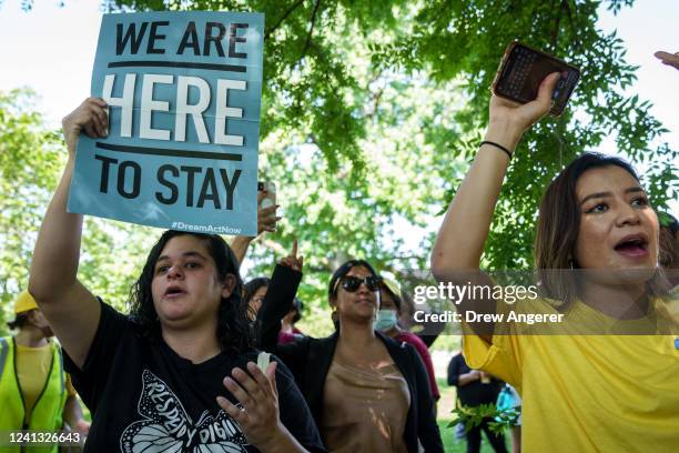 Immigration advocates rally to urge Congress to pass permanent protections for DACA recipients and create a pathway to citizenship, near the U.S....