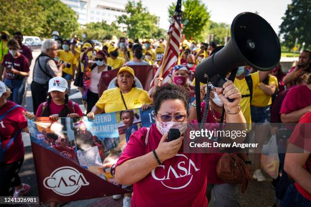 Immigration advocates rally to urge Congress to pass permanent protections for DACA recipients and create a pathway to citizenship, near the U.S....