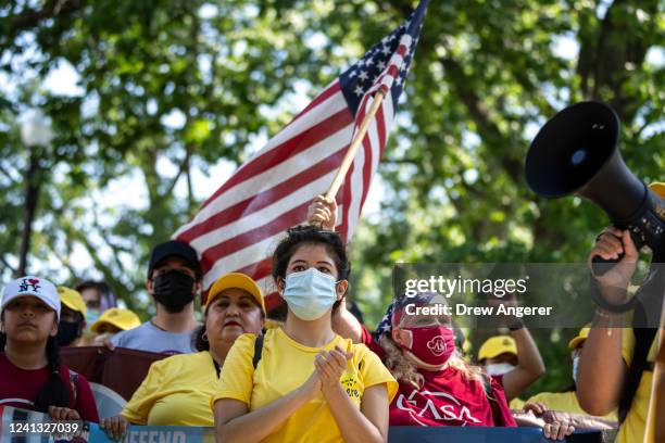 Immigration advocates rally to urge Congress to pass permanent protections for DACA recipients and create a pathway to citizenship, near the U.S....