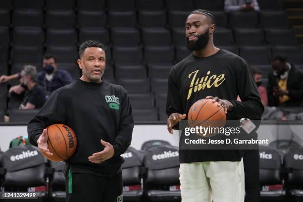 Assistant coach Damon Stoudamire and Jaylen Brown of the Boston Celtics participate during 2022 NBA Finals Practice and Media Availability on June...