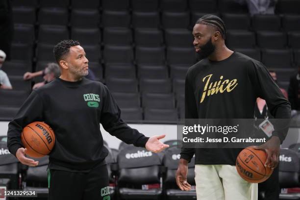 Assistant coach Damon Stoudamire and Jaylen Brown of the Boston Celtics participate during 2022 NBA Finals Practice and Media Availability on June...