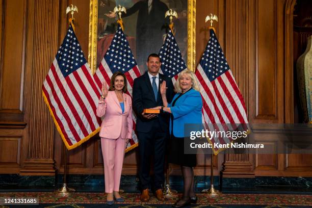 Speaker of the House Nancy Pelosi administers the House oath to Rep. Connie Conway , with Rep. David Valadao holding the Bible, during a ceremonial...