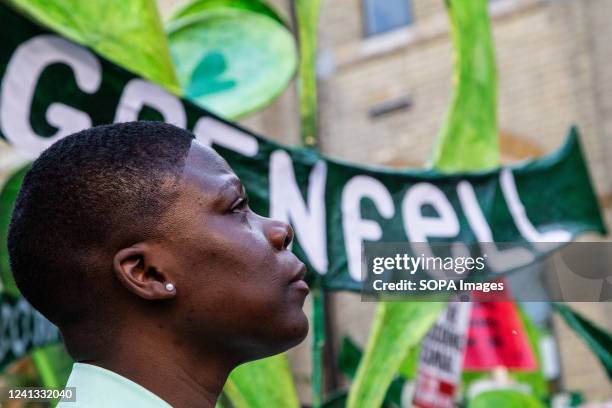 Woman attends the 5th anniversary of the Grenfell tower fire silent walk. Grenfell Tower fire survivors and bereaved relatives began a day of...