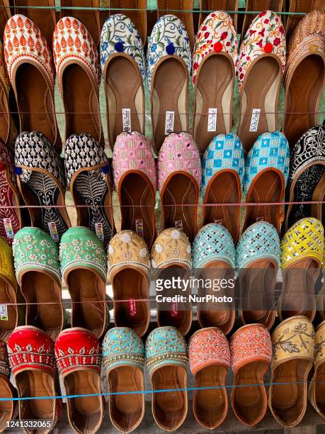 Colourful shoes displayed at a shop in Agra, Uttar Pradesh, India, on May 07, 2022.