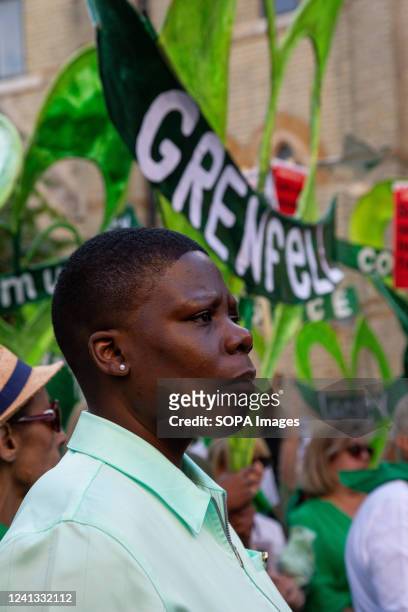 Woman attends the 5th anniversary of the Grenfell tower fire silent walk. Grenfell Tower fire survivors and bereaved relatives began a day of...